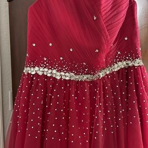 Never used , size M teenager large dress